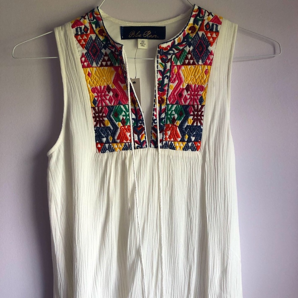 NWT Francesca’s white colorful embroidered top!